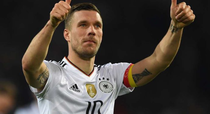 Lukas Podolski handed the armband as he ends his international career